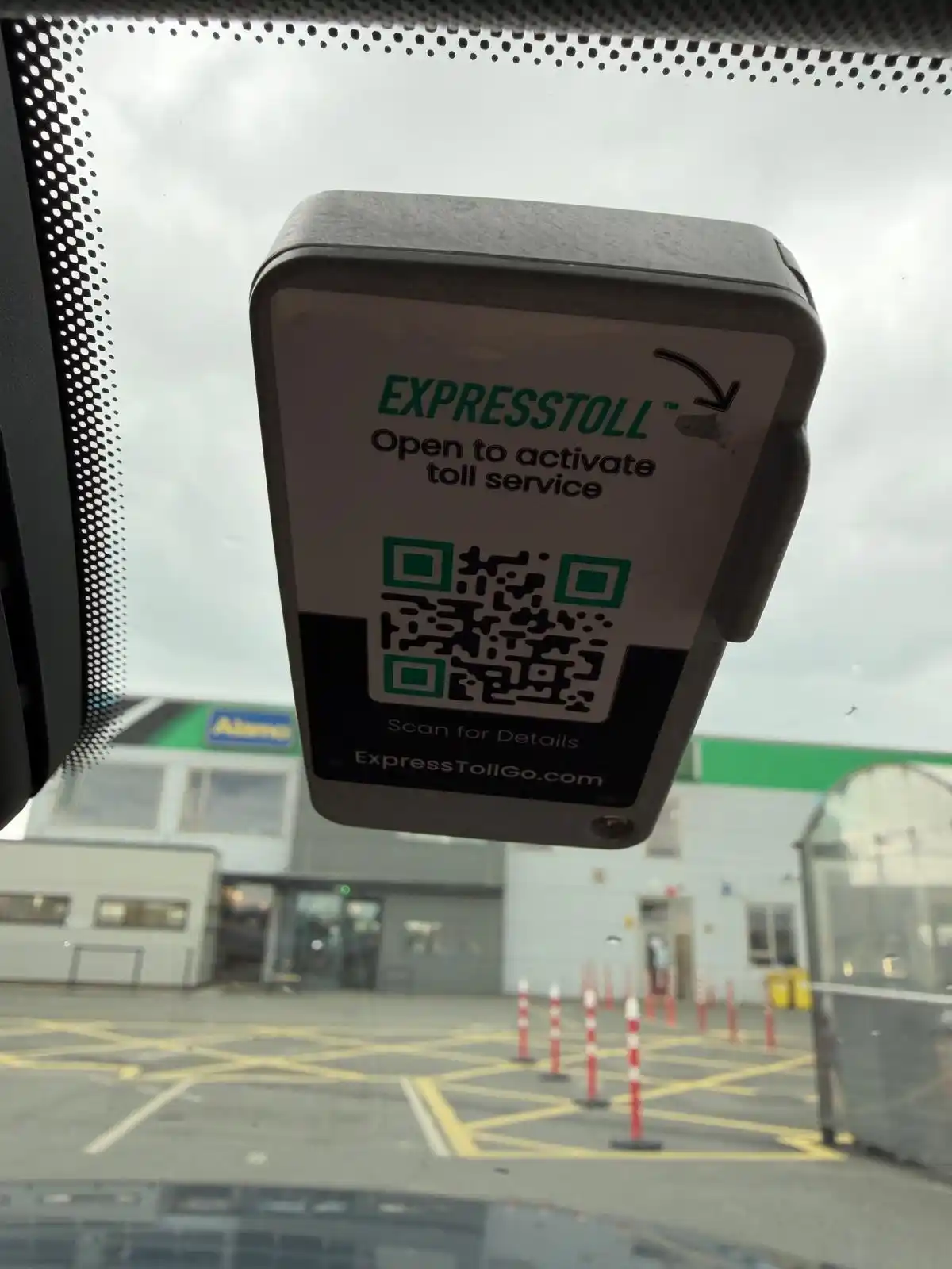 The toll tag box closed, with its front cover flat against the box.
